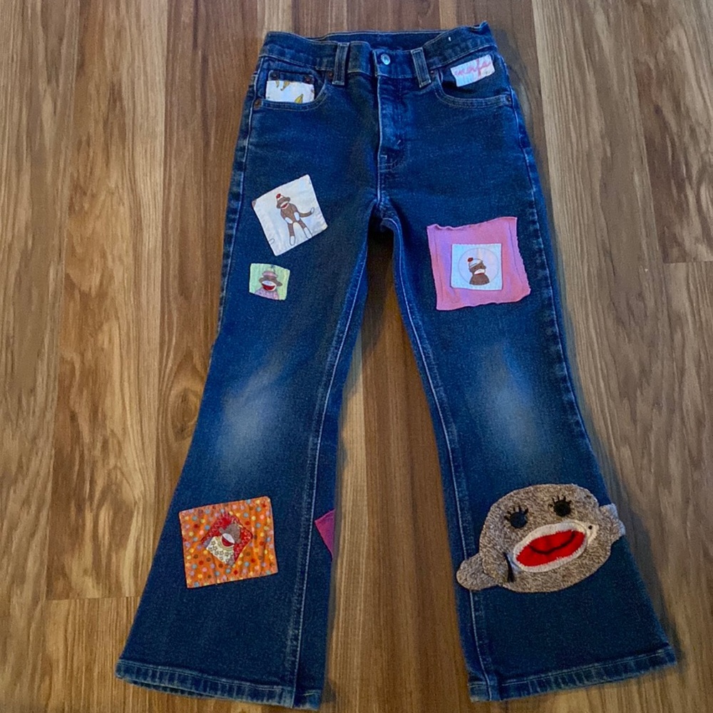 Levi’s with hand sewn monkey patches Girls Size 6